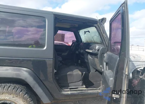 2011 Jeep Wrangler Sport z USA, uszkodzony, nr VIN 1J4AA2D17BL637575